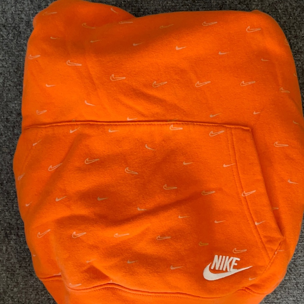 Orange nike hoodie w small logos all over size L